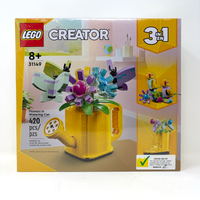 Flowers in Watering Can (Certified)